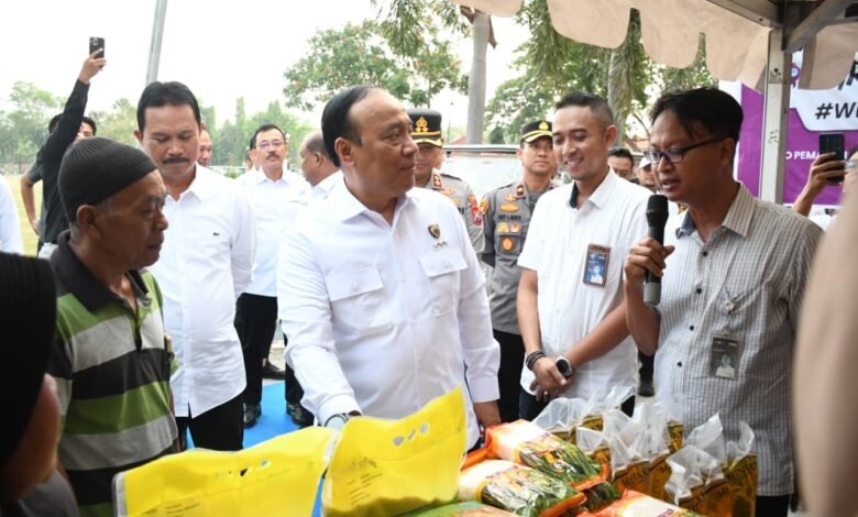 POLRI DISTRIBUSIKAN 6 TON BERAS MENGGELAR GERAKAN PASAR MURAH DI MADIUN, SINERGI DENGAN BULOG TEKAN INFLASI IMG 20250809 WA0017